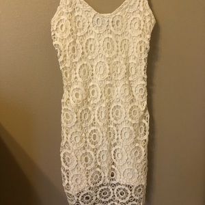 A cream lace mini dress